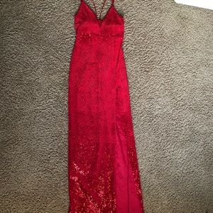 Red sparkly Prom dress with slit